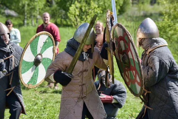 Children fight with swords at the festival of medieval culture " — Stok fotoğraf