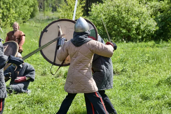 Children fight with swords at the festival of medieval culture " — Stok fotoğraf