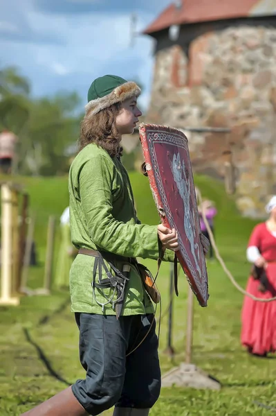 A knight with a spear on a horse at the Russian Fortress festiva — Stock Photo, Image