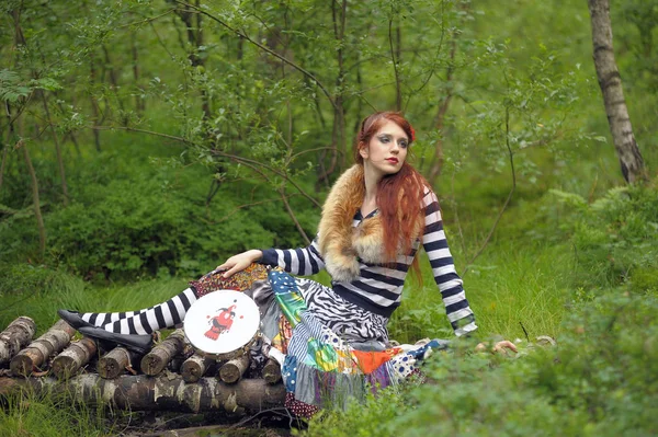 Red-haired gypsy with a tambourine — Stock Photo, Image