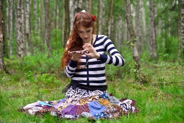 Red-haired gypsy in colorful clothes, — Stock Photo, Image