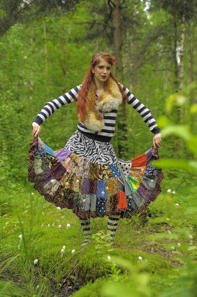 Red-haired gypsy in colorful clothes, — Stock Photo, Image