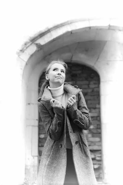 Beautiful girl in a gray coat — Stock Photo, Image