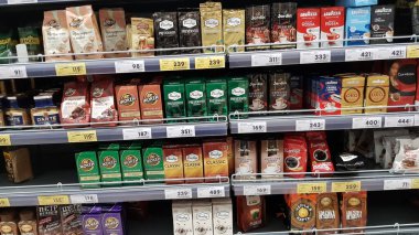 Russia, St. Petersburg 31.03.2020 Coffee shelves in a supermarket during the coronavirus pandemic clipart