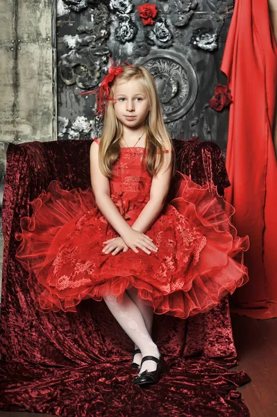 Blonde Girl Red Elegant Dress Red Hairpin Her Hair Sitting — Stock Photo, Image