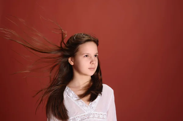Brunette Child Girl Studio Red Background Flying Hair — Stock Photo, Image