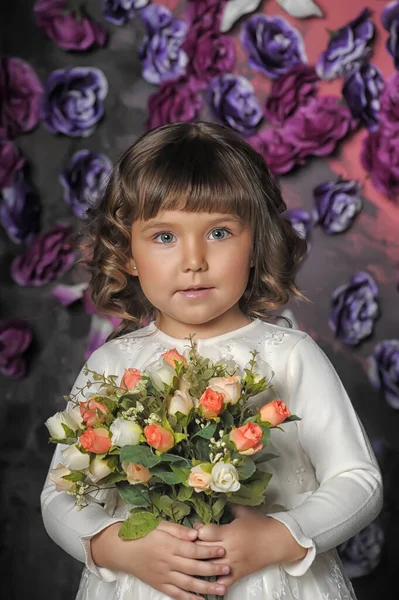 Little Brunette Girl Curls White Sweater Flowers Her Hands Floral — Stock Photo, Image