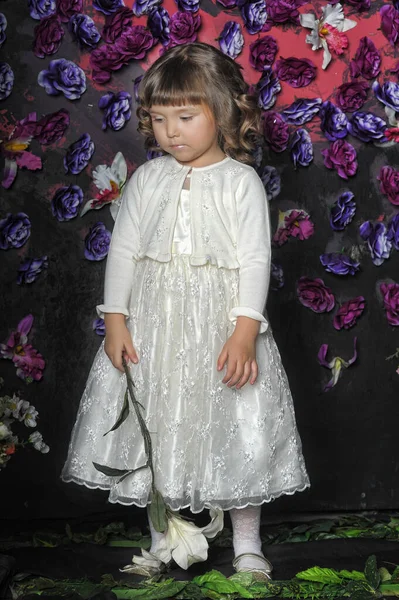 Little Brunette Girl Curls White Sweater Flowers Her Hands Floral — Stock Photo, Image