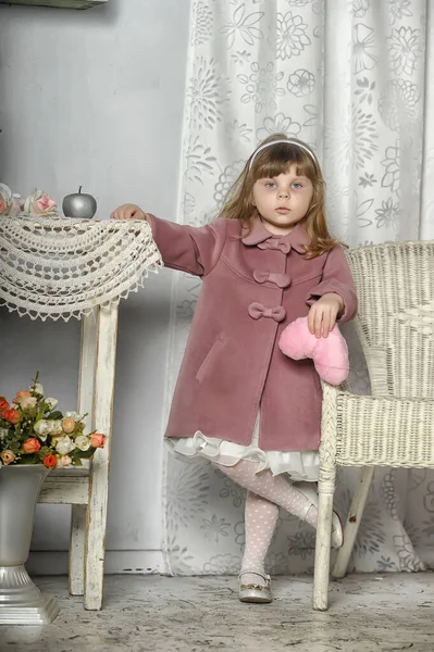 Little Girl Pink Coat Table Vintage Interior — Stock Photo, Image