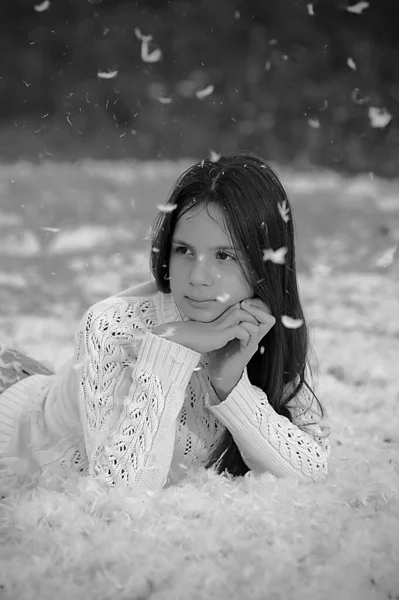 Young Girl Long Hair White Sweater Plays Happy White Feathers — Stock Photo, Image