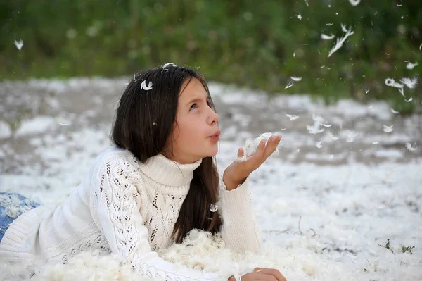 Young Girl Long Hair White Sweater Plays Happy White Feathers — Stock Photo, Image
