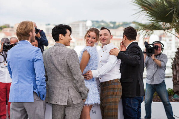 CANNES, FRANCE - MAY 10, 2018: Cinematographer Vladislav Opelyants, actor Teo Yoo, actress Irina Starshenbaum, actor Roman Zver and director Ilya Stewart attend the photocall for 'Leto' during the 71st annual Cannes Film Festival