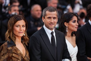 CANNES, FRANCE - MAY 13, 2018: Marina Fois, Guillaume Canet, Leila Bekhti attending screening of 'Sink Or Swim (Le Grand Bain)' during the 71st annual Cannes Film Festival clipart