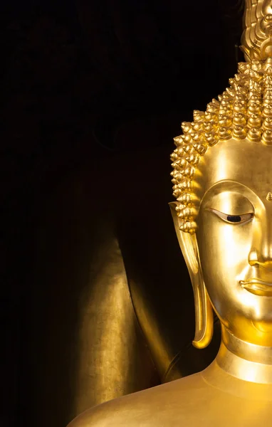 Golden Buddhist statue face