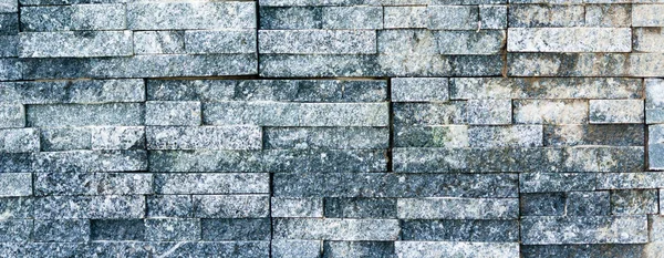 Veggbekledning av stein med murstein – stockfoto