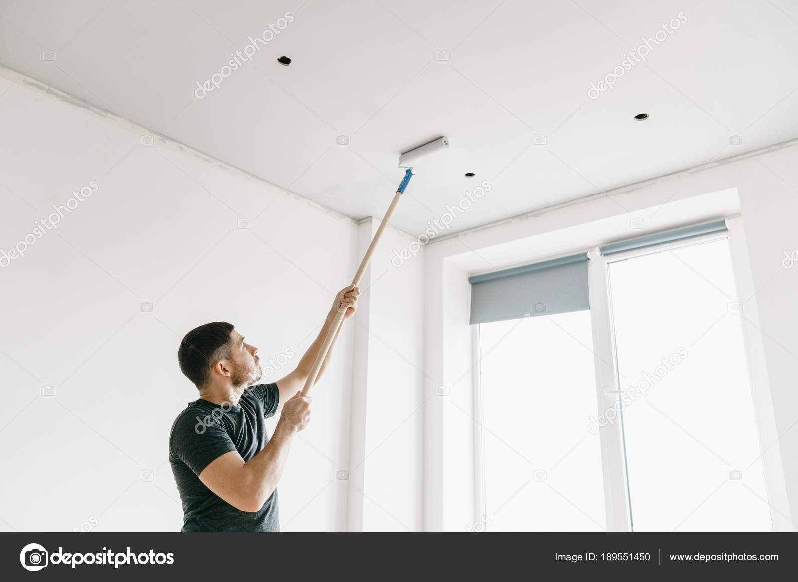 Man Gray Shirt Roller Long Stick Paints Ceiling Gray Home