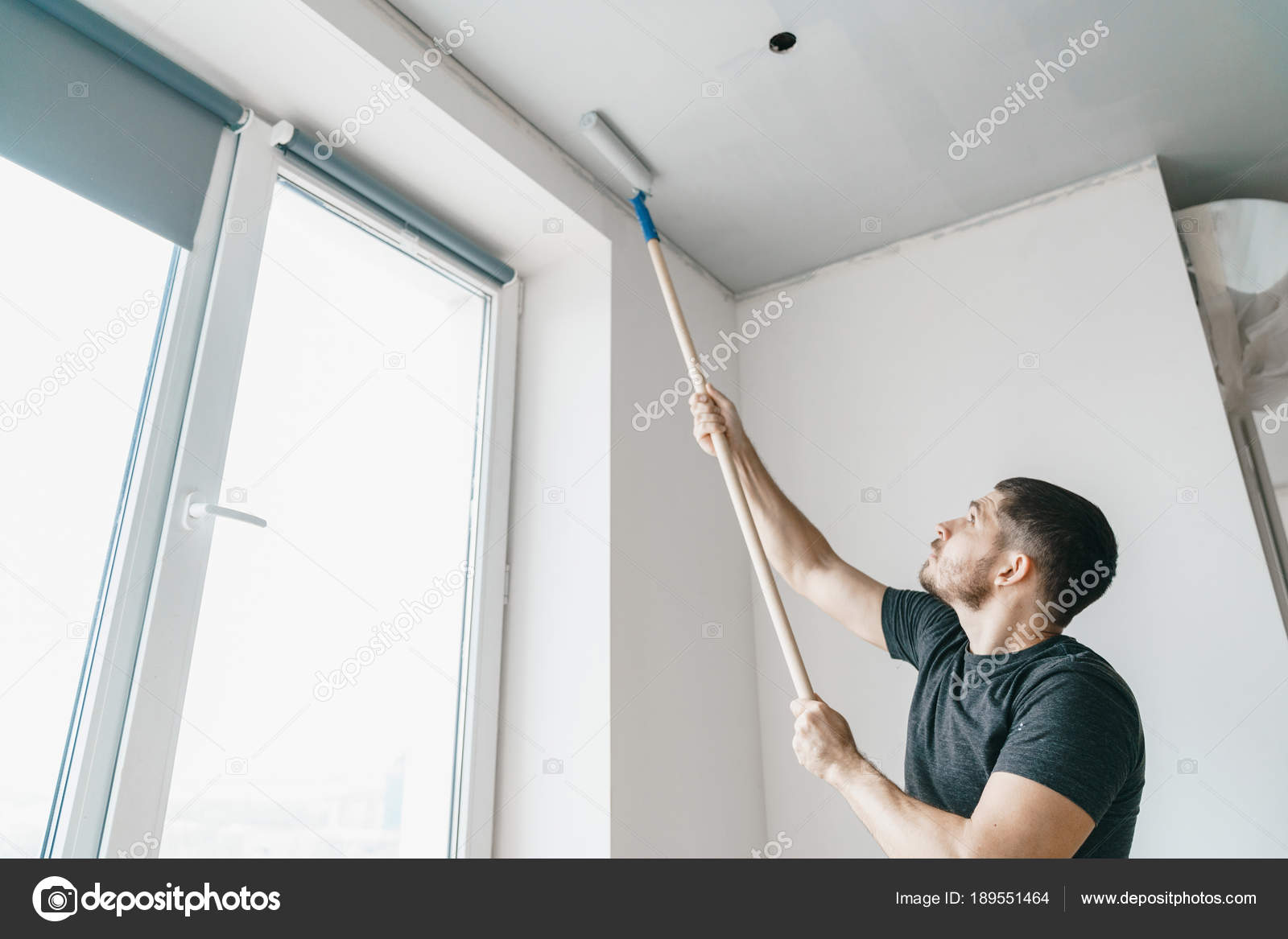 Man Roller His Hands Paints Ceiling Gray Color Window His Stock