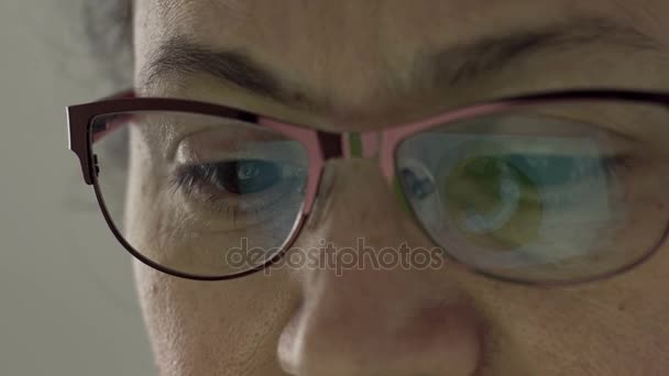 Whatsapp Logo Reflection in Glasses of Middle Aged Female — Stock Video