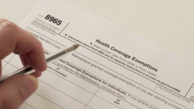 IRS formunu 8965 sağlık kapsama muafiyetler