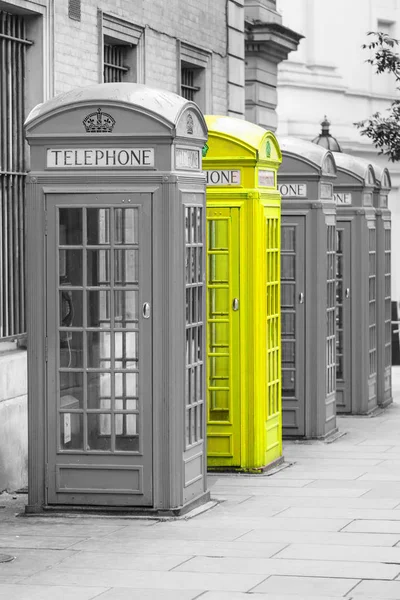 Five Red London Telephone boxes all in a row