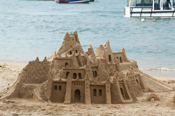 Castle made of sand on beach in Buzios, Rio de Janeiro, Brazil
