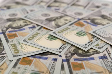 Heap of cash in hundred dollar bills clipart