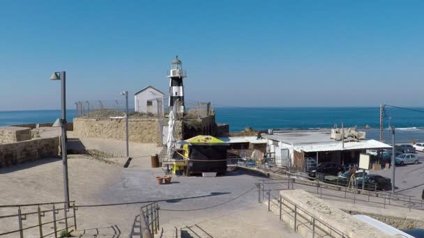 Phare et restaurants en bord de mer à Akko ou Acre, Israël — Video