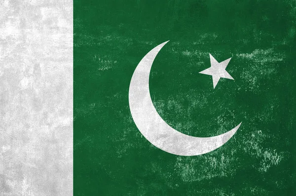 Pakistan - Pakistaanse vlag op oude Grunge textuur achtergrond — Stockfoto