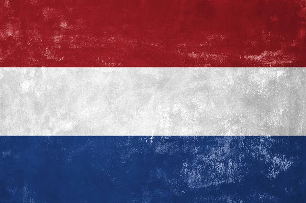 Niederlande - holländische Flagge auf altem Grunge-Hintergrund — Stockfoto