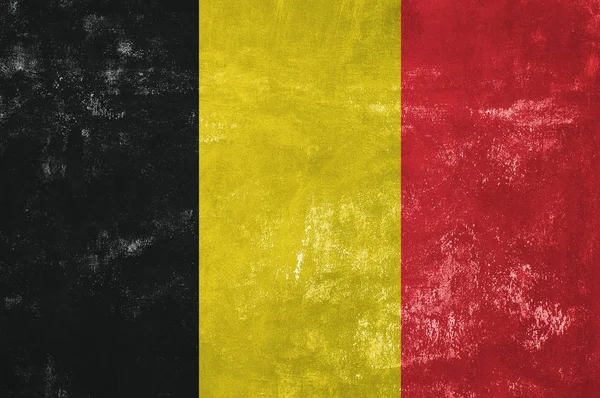 België - Belgische vlag op oude Grunge textuur achtergrond — Stockfoto