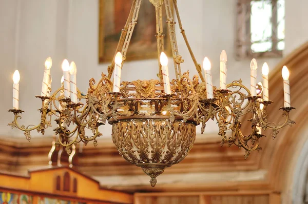 Big bronze chandelier in christian church — Stock Photo, Image