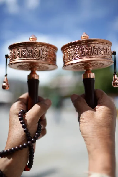 Prayer Wheels against blurred blue sky in Tibet — Stock Photo, Image