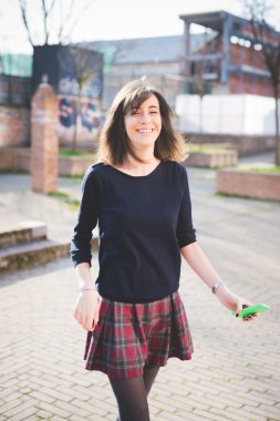 woman walking through streets