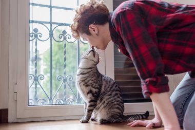 woman and her european cat 