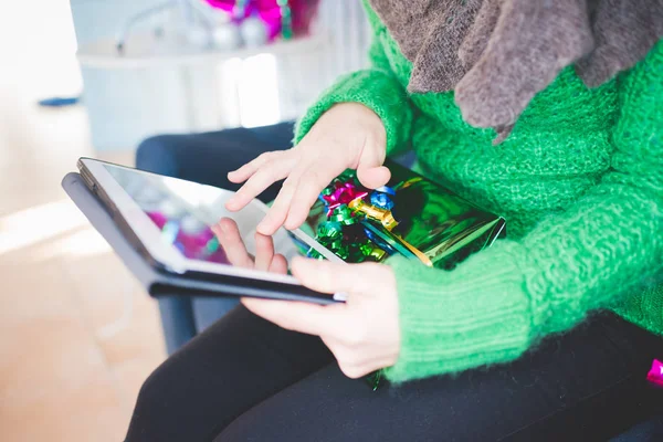 Woman tapping on the screen of tablet — Stock Photo, Image