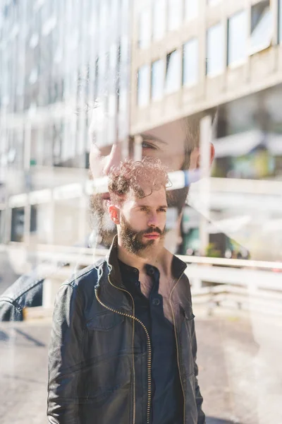 Bearde man outdoor overlooking pensive — Stock Photo, Image
