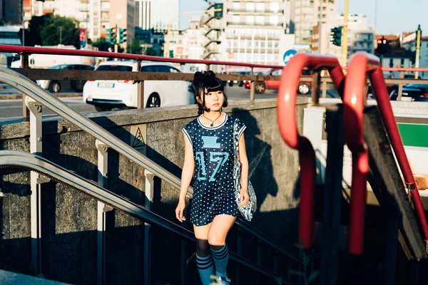 Millennial woman skater walking — Stock Photo, Image