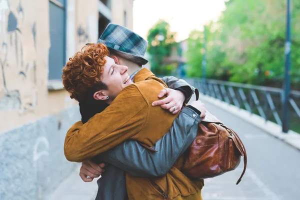 man and woman meeting in street