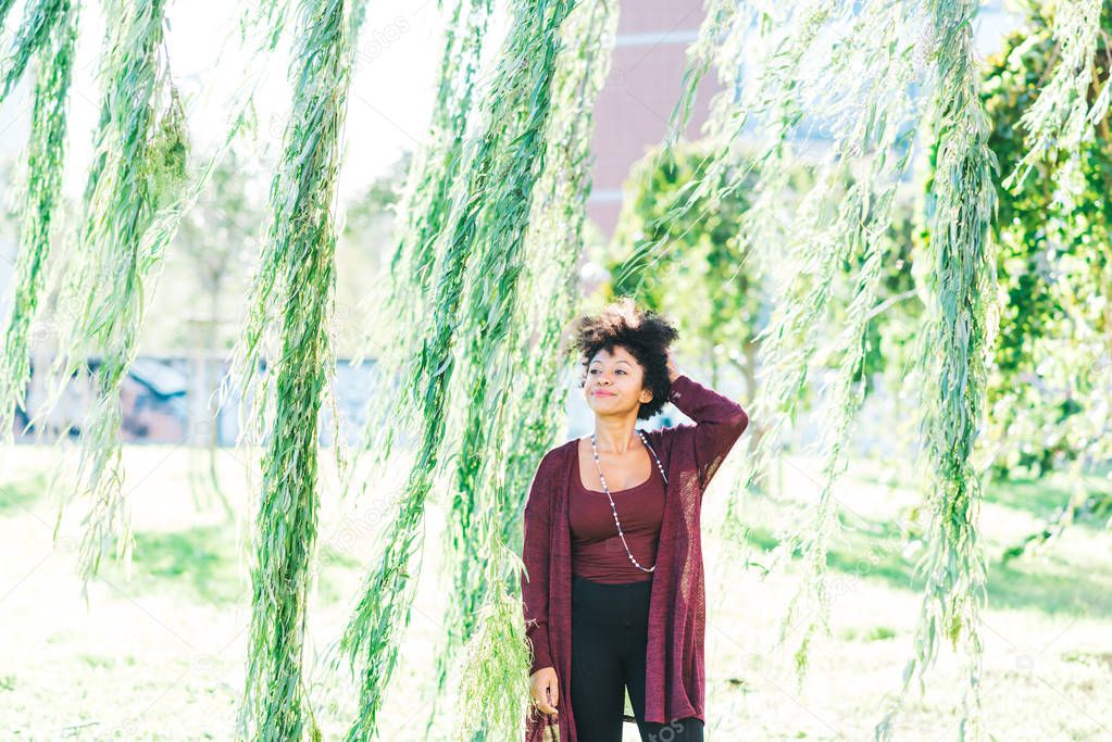 woman looking at camera in city