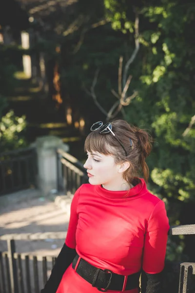 Vintage hipster woman in street town — стоковое фото