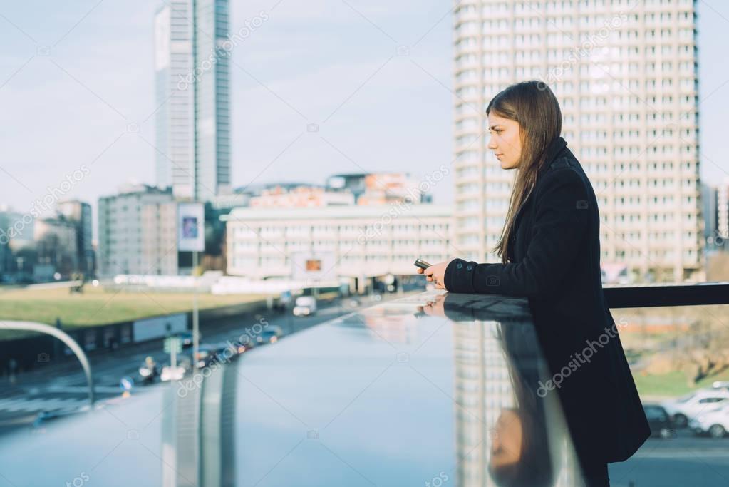 woman outdoor using smartphone