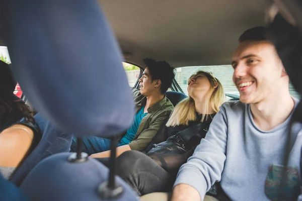 Grupo Amigos Multiétnicos Viajando Coche Divirtiéndose —  Fotos de Stock