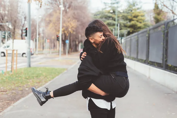 Two Women Lesbian Couple Outdoors Hugging Love Interaction Couple Concept — 스톡 사진