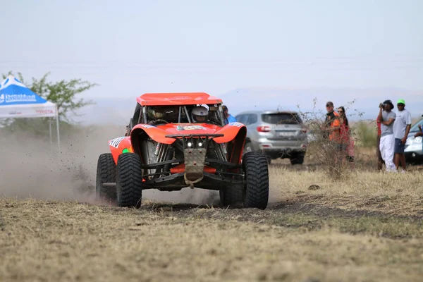 Speeding orange Bat rally car front view — Stock Photo, Image