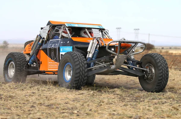 Forty Five degree close-up view of Speeding orange Zarco rally c — Stock Photo, Image