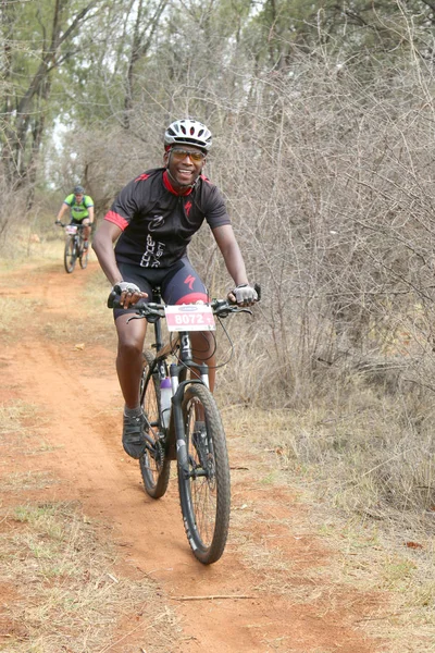 Middle aged Black African man enjoying outdoors ride at Mountain — Stock Photo, Image