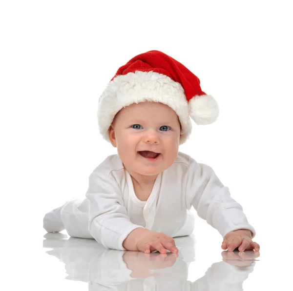 Enfant bébé bébé fille couché en rouge Noël santa chapeau heureux sm — Photo