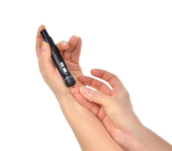 Diabetes lancet in hand prick finger to make punctures to obtain — Stock Photo, Image