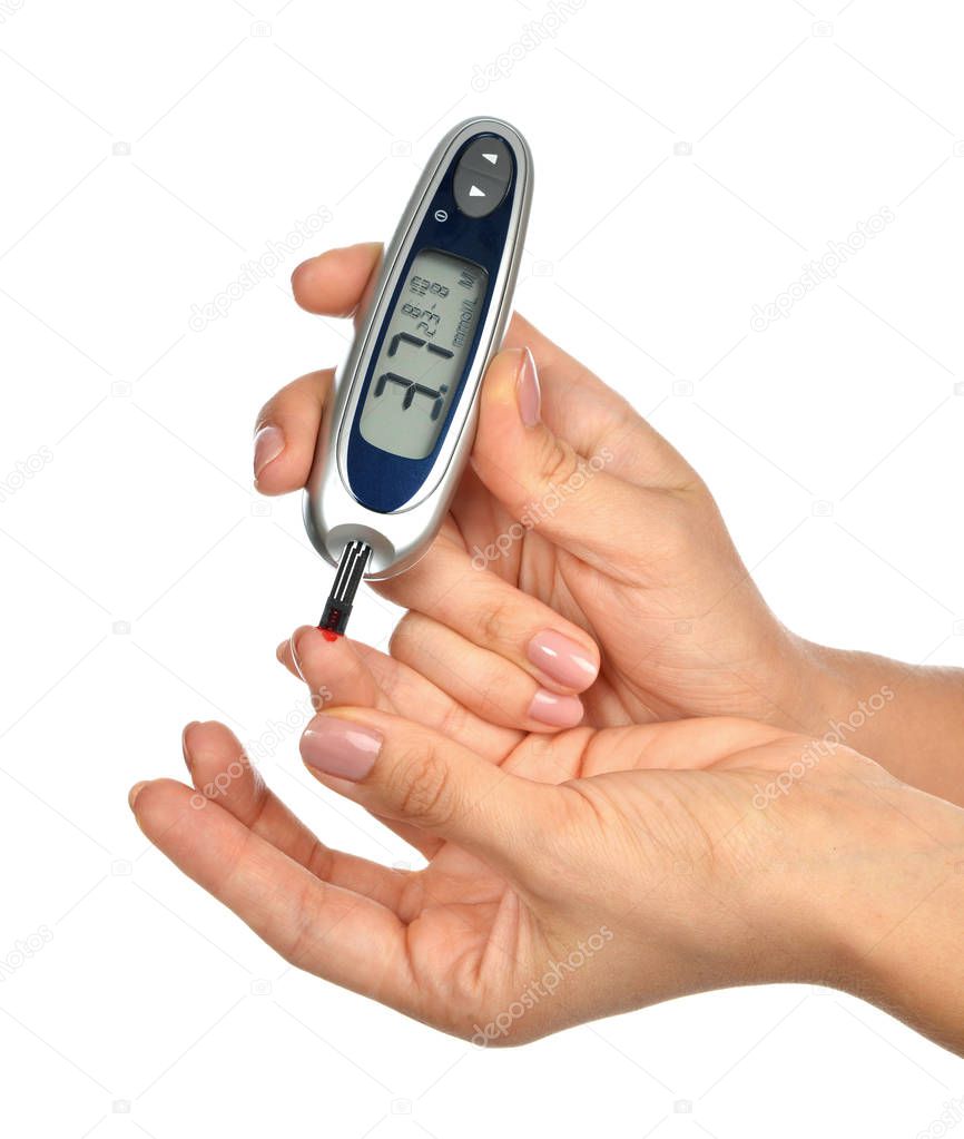 First type Diabetes patient measuring glucose level blood test use glucometer and small drop of blood from finger