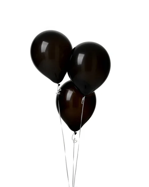 Manojo de tres grandes globos de látex negro para la fiesta de cumpleaños —  Fotos de Stock